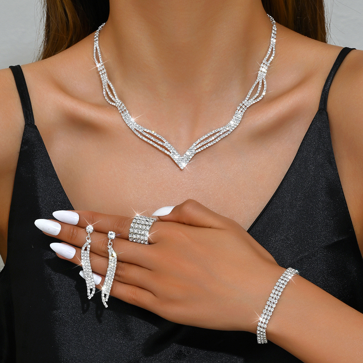 472599424-5 silver necklace earrings bracelet ring