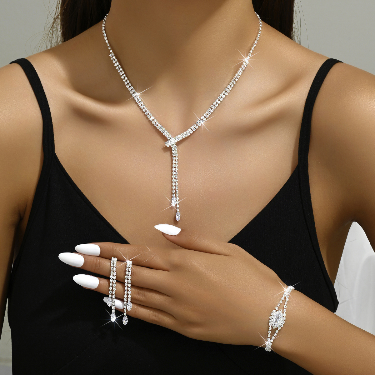 B silver necklace earrings bracelet