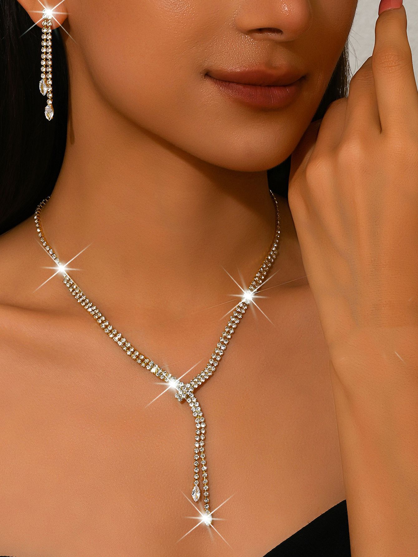 E gold necklace earrings