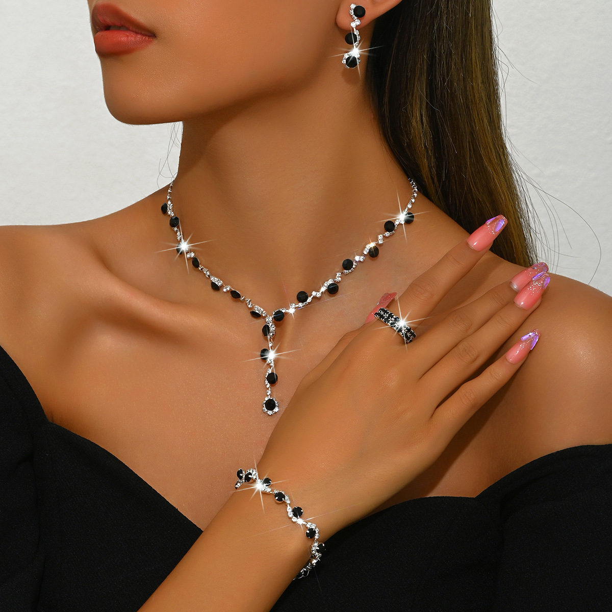 E black necklace earrings bracelet ring 2 rows