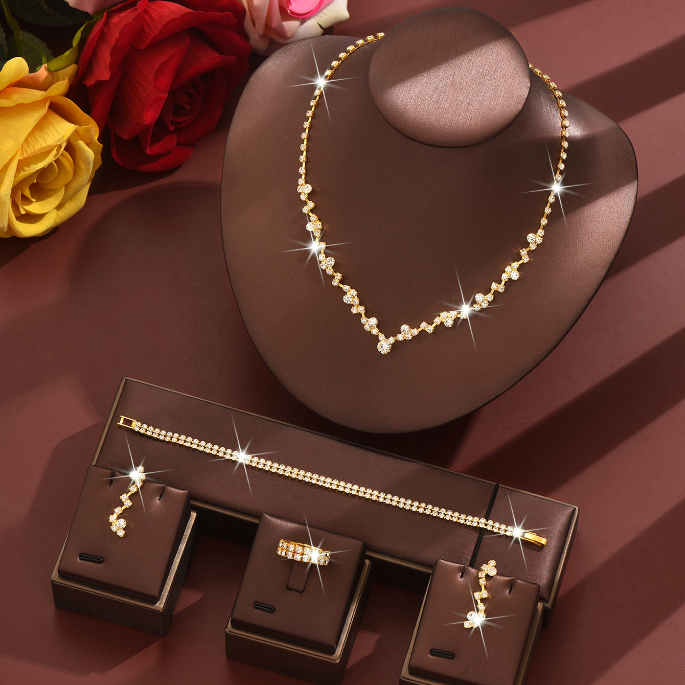 B gold necklace, earrings, bracelet and ring set