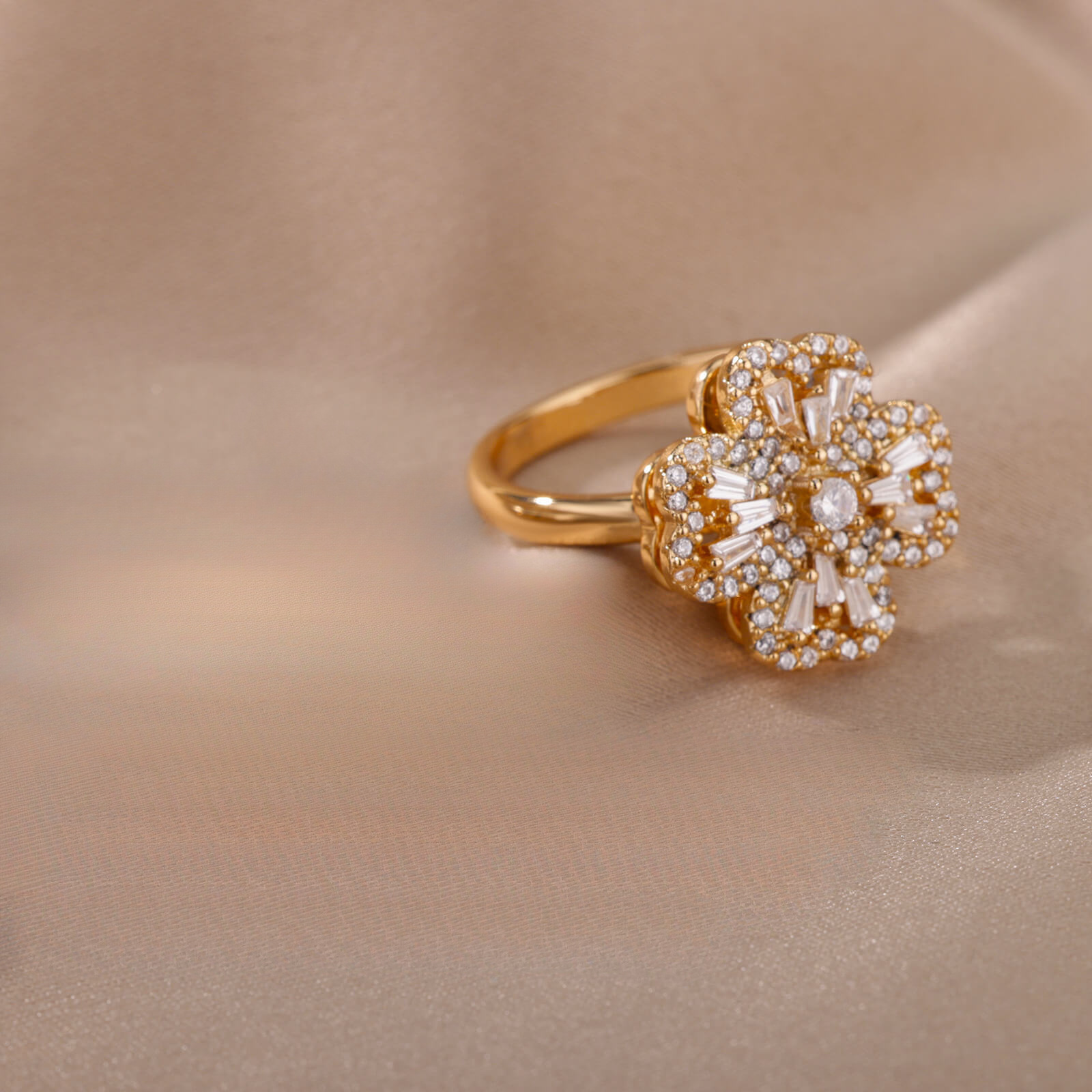 Four-leaf clover full of diamonds and gold