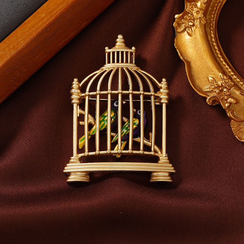 Dumb gold bird cage