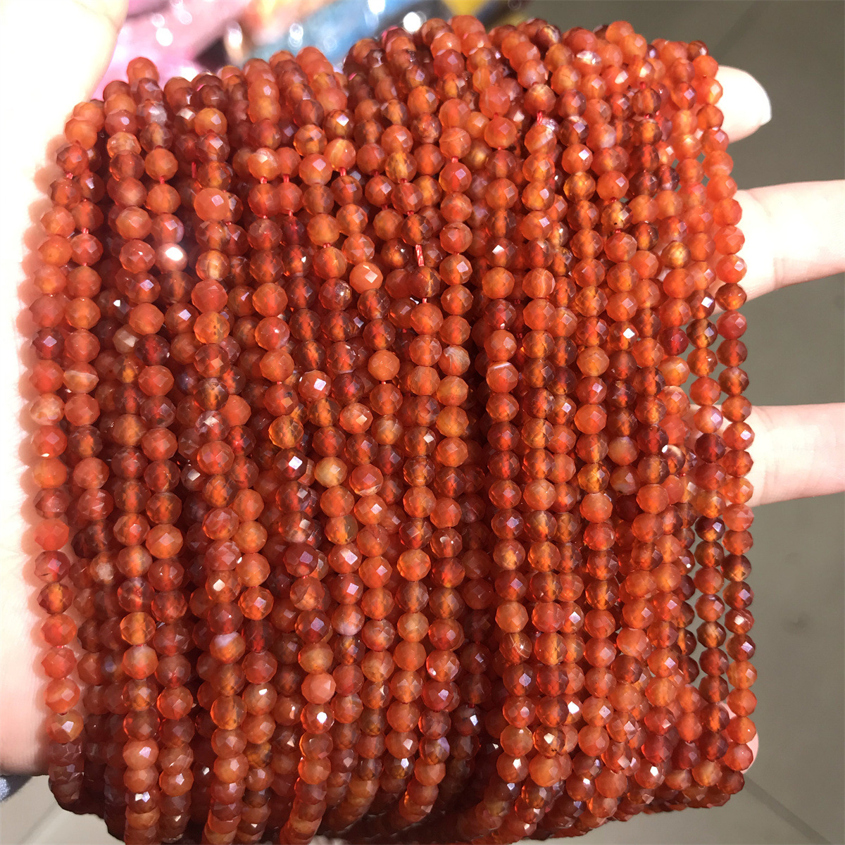 Faceted round beads: 4mma grade red agate