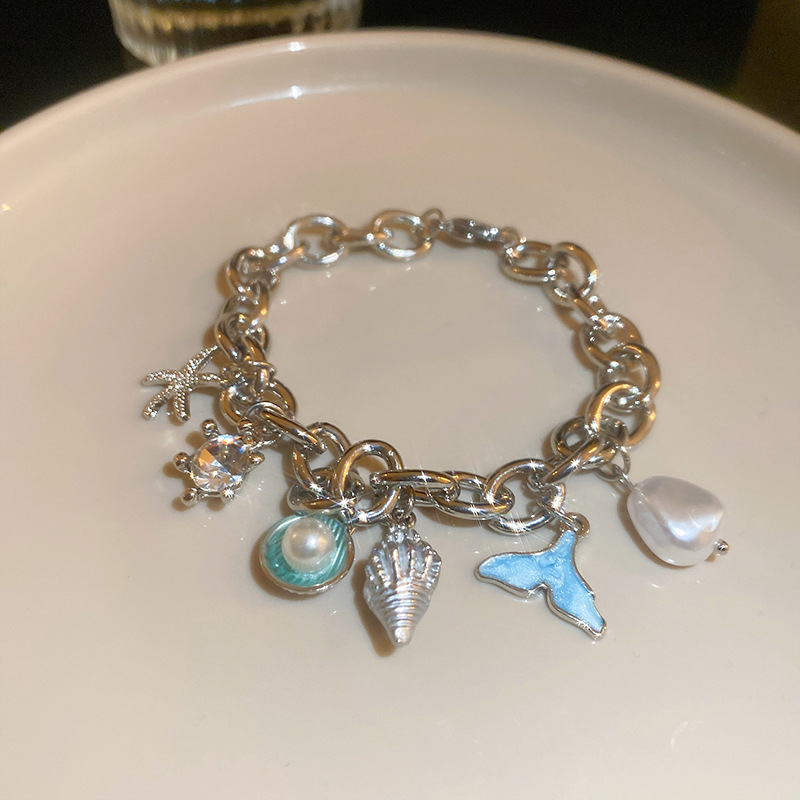 silver Starfish Conch Bracelet