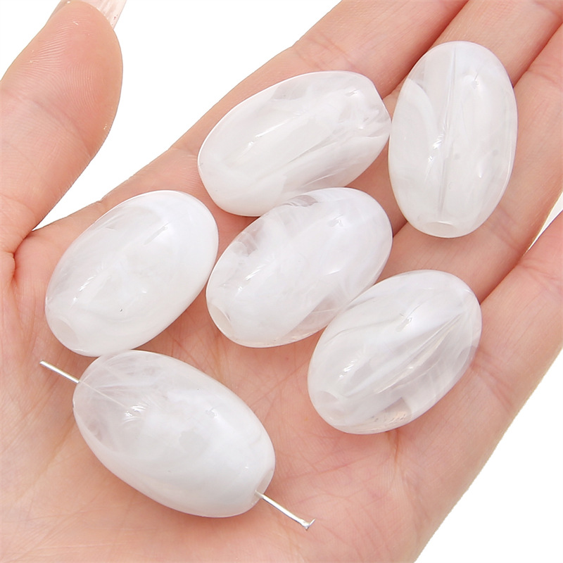 White oval beads 18x 29mm/ aperture about 5mm 5/bag
