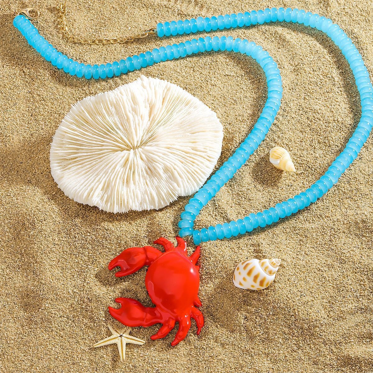 Blue beaded red crab necklace