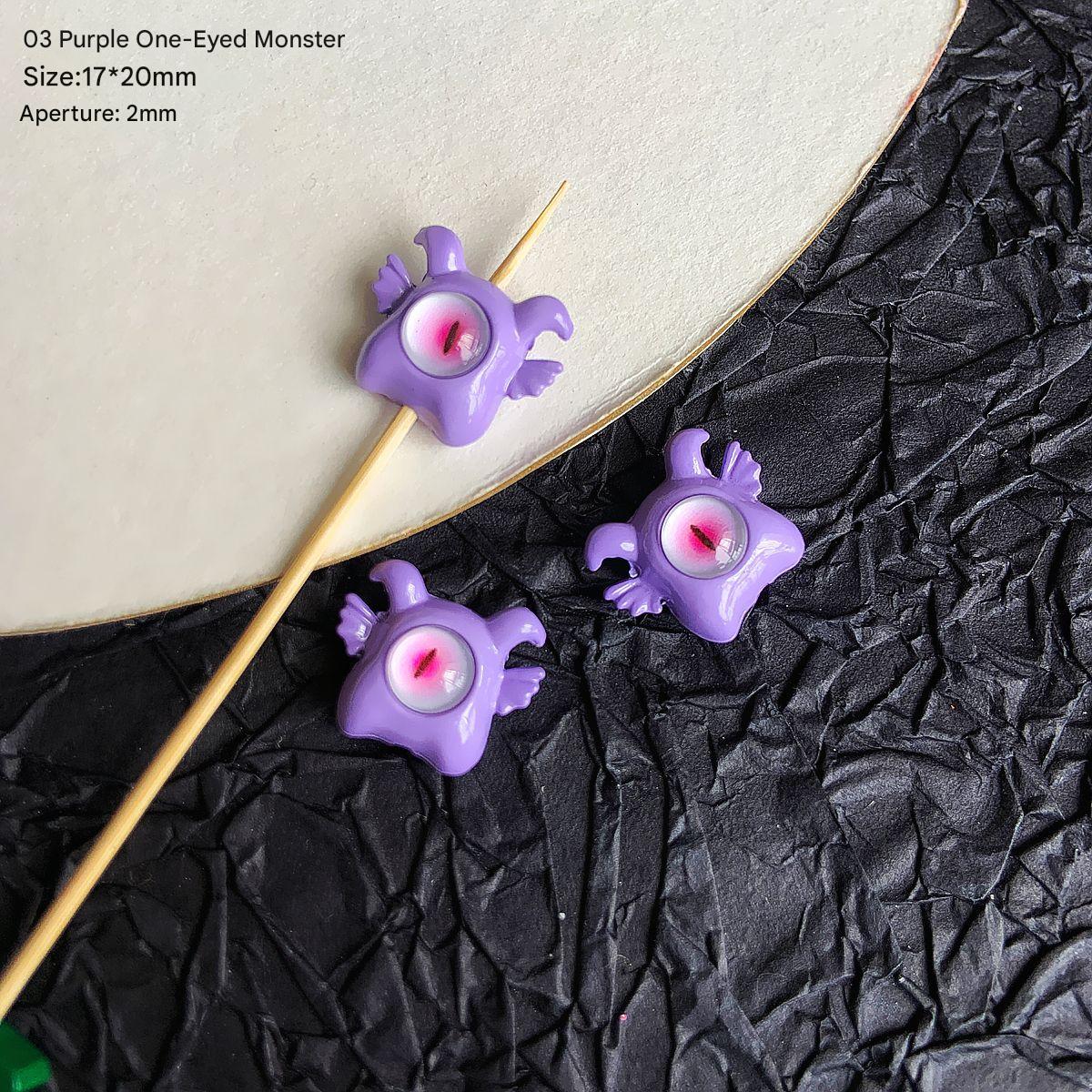 03/17x20mm/ purple one-eyed little monster (1)