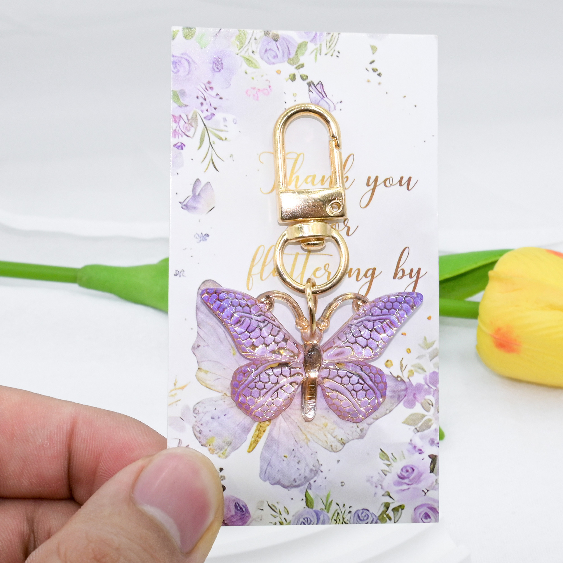 Purple butterfly keychain + cardboard