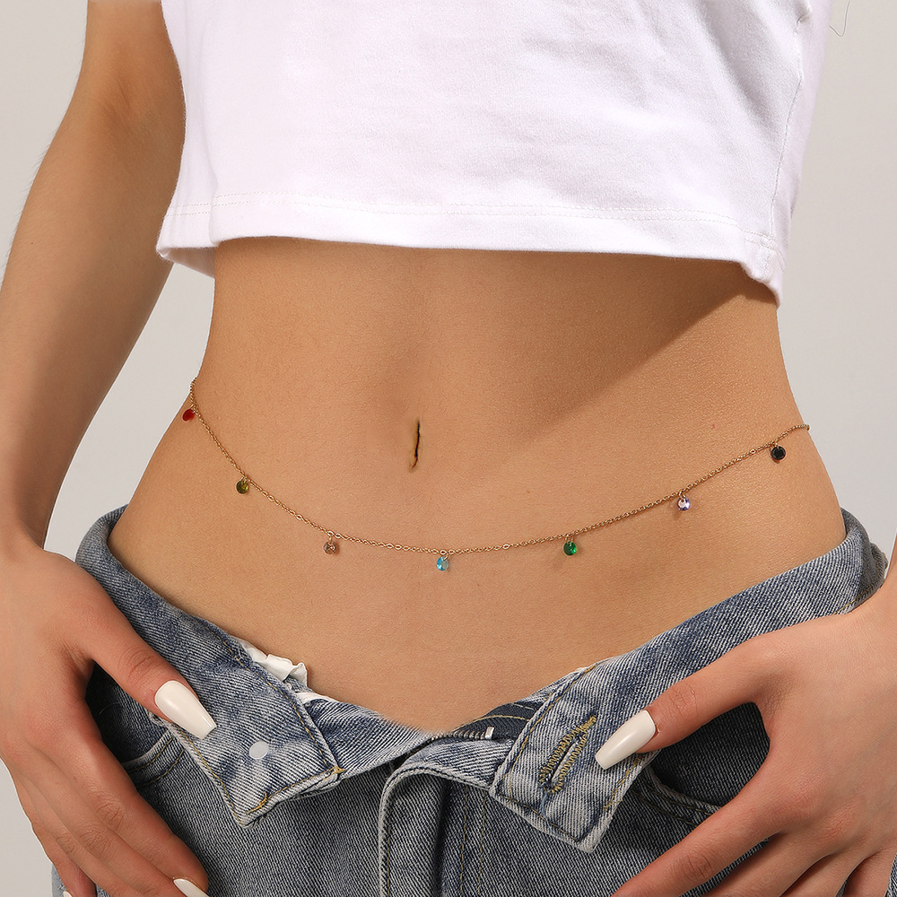 Gold colored diamond waist chain