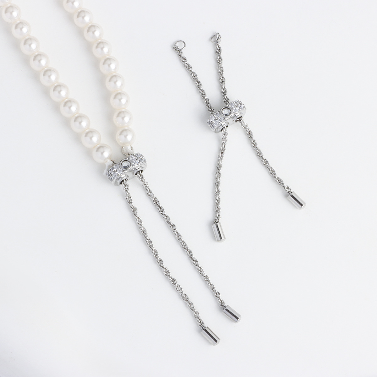 Set of white gold white diamond pull-out extension chains
