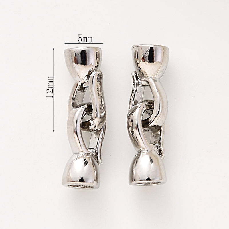 #232 pair of white gold buttons (two)