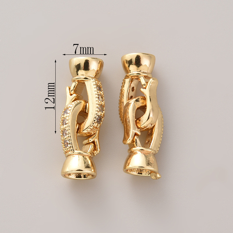 #278 18k gold pair with zirconium buttons (two)