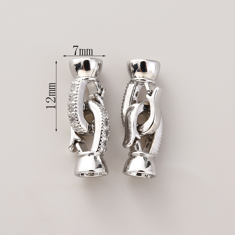 #279 pair of white gold with zirconium buttons (two)