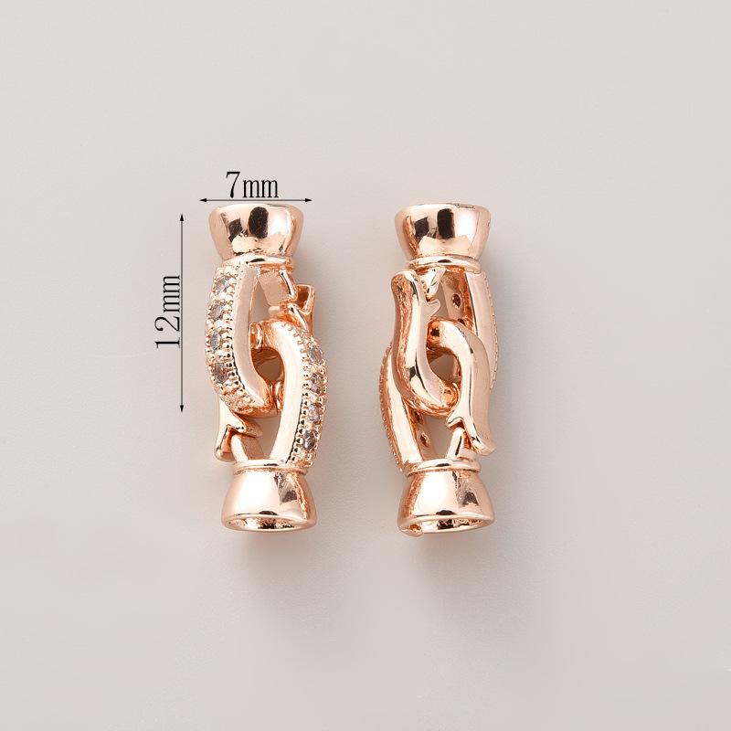 #281 pair of rose gold with zirconium buttons (two)