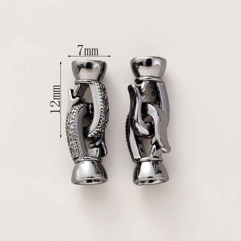 # 282 pair of gun black with zirconium buttons (two)