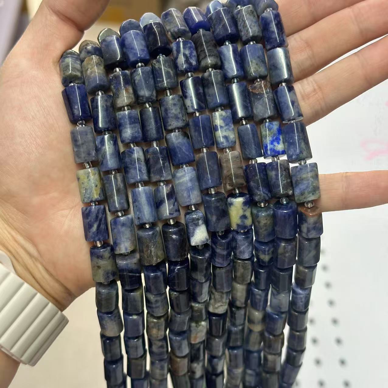 Blue stone is about 7*13mm (small capsules, smooth surface)