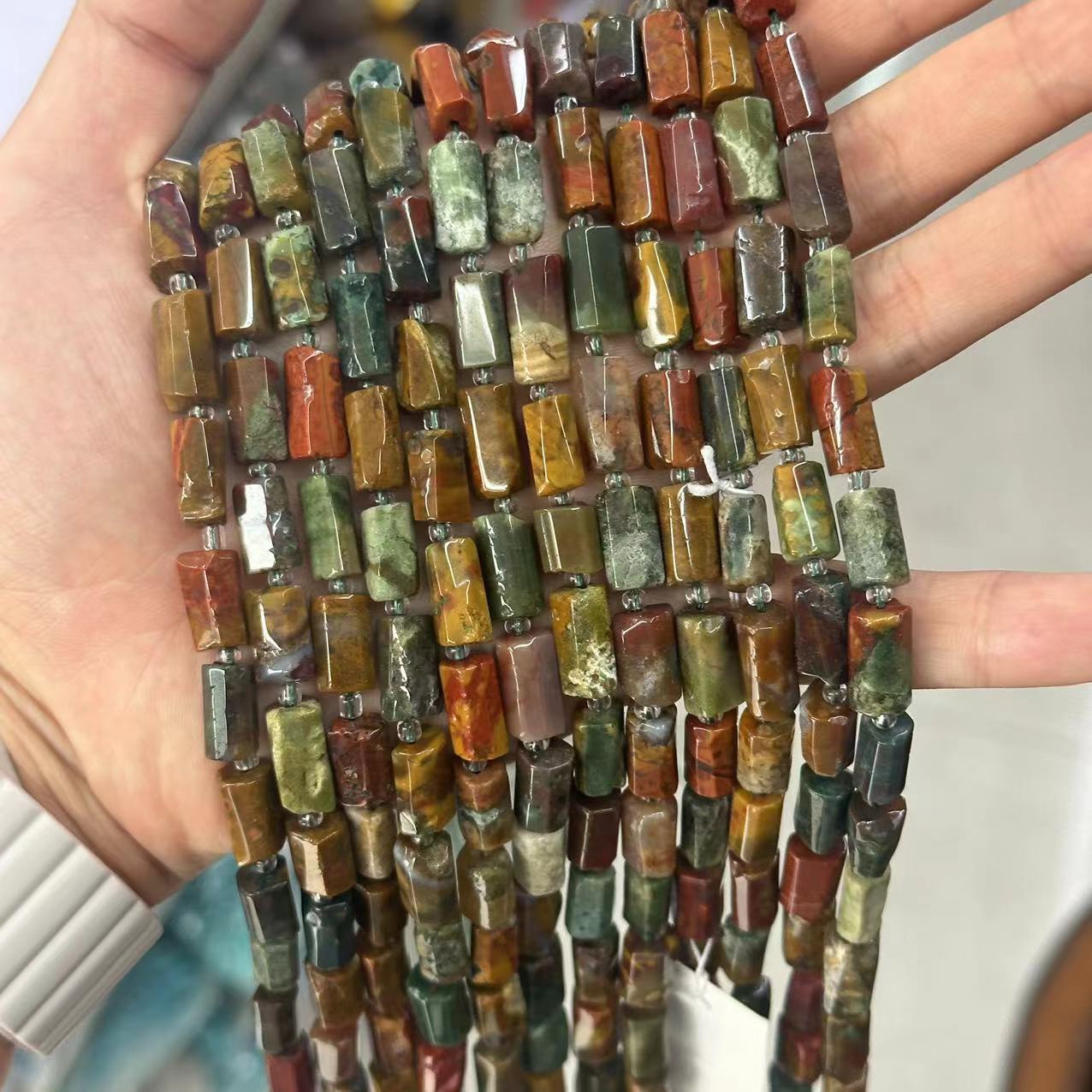 Ocean agate is about 7*11mm (small capsules, glossy surface)