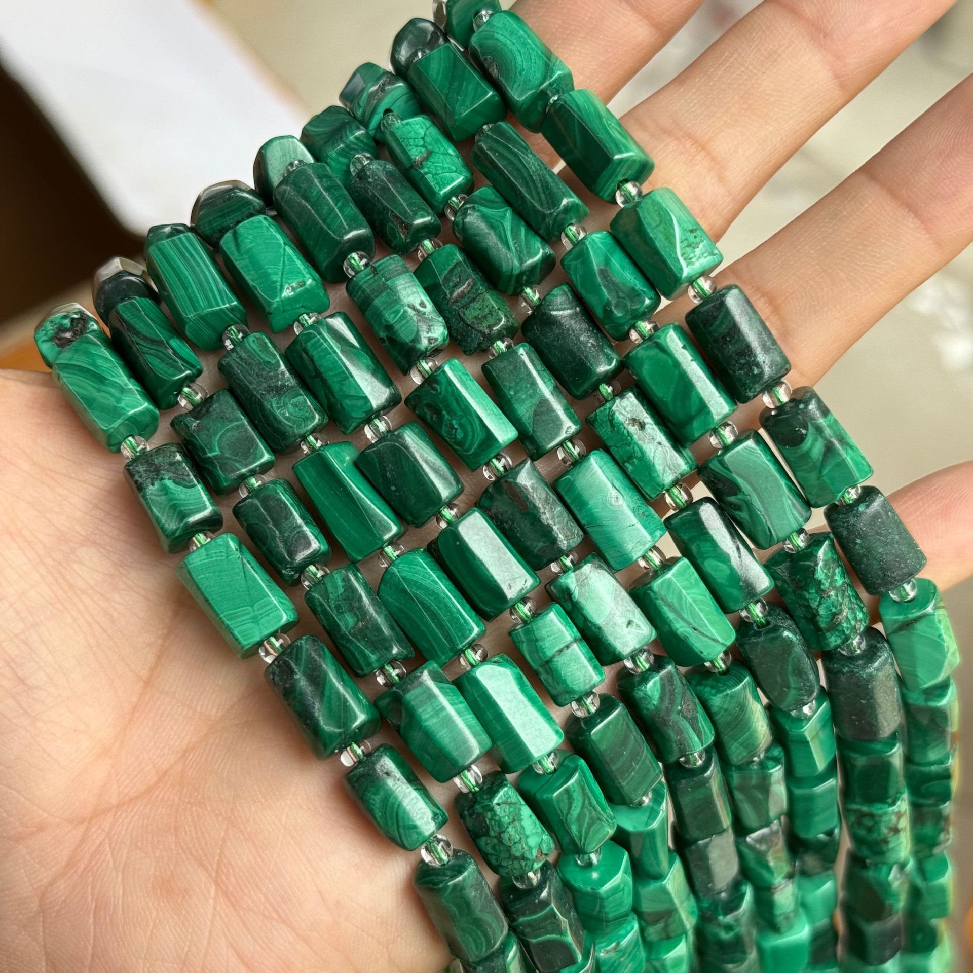 Malachite is about 7*11mm (small capsules, glossy surface)