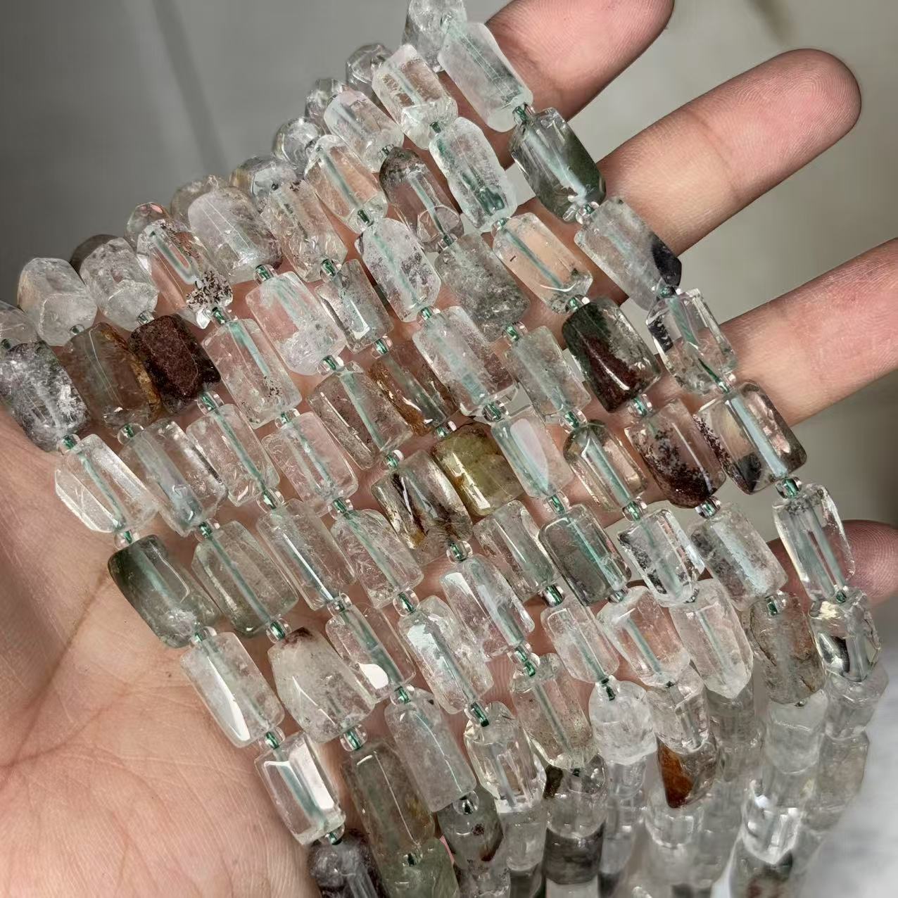 Green ghost crystal about 7*11mm (small particles, smooth surface)