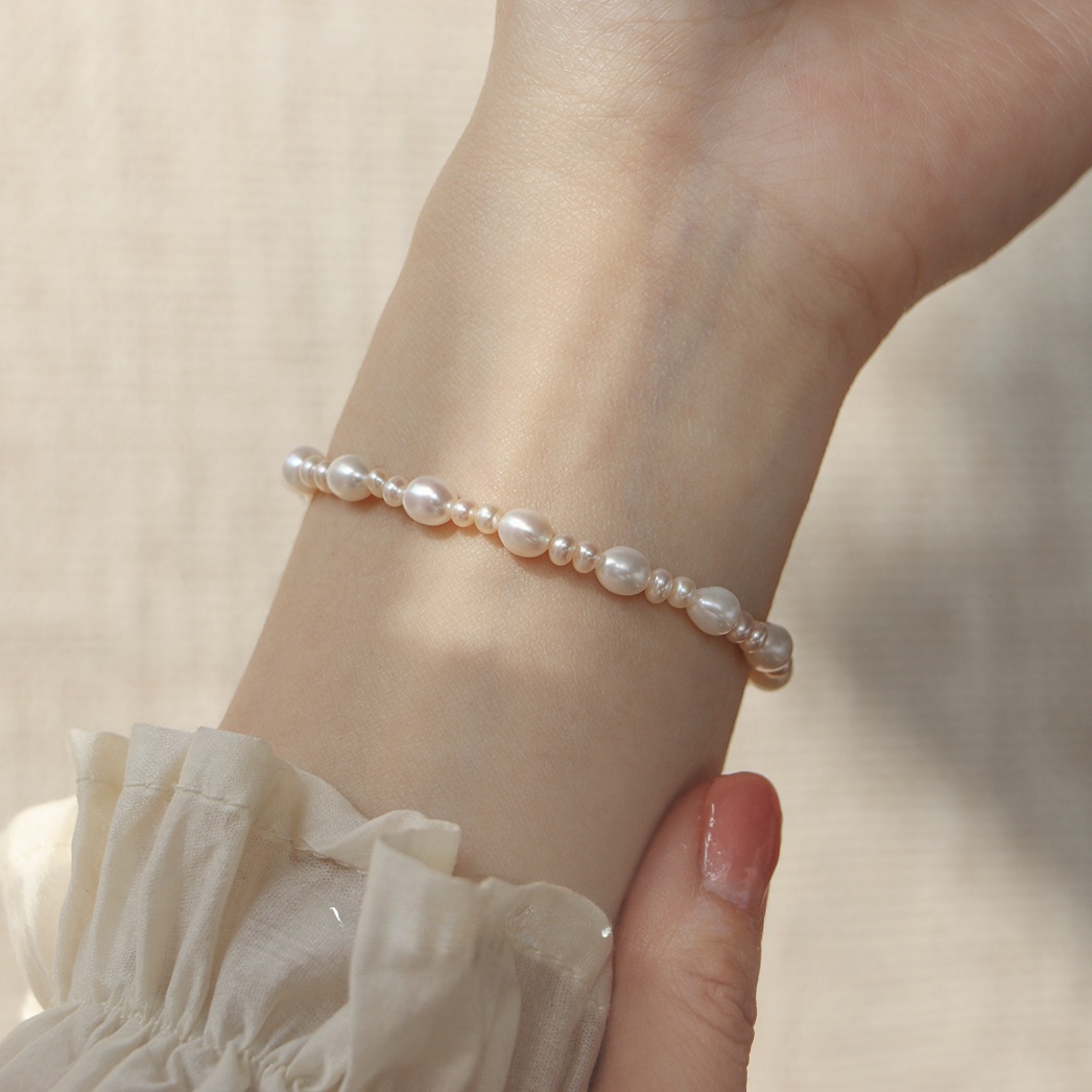 Rice capsules freshwater pearls shell rose bracelet