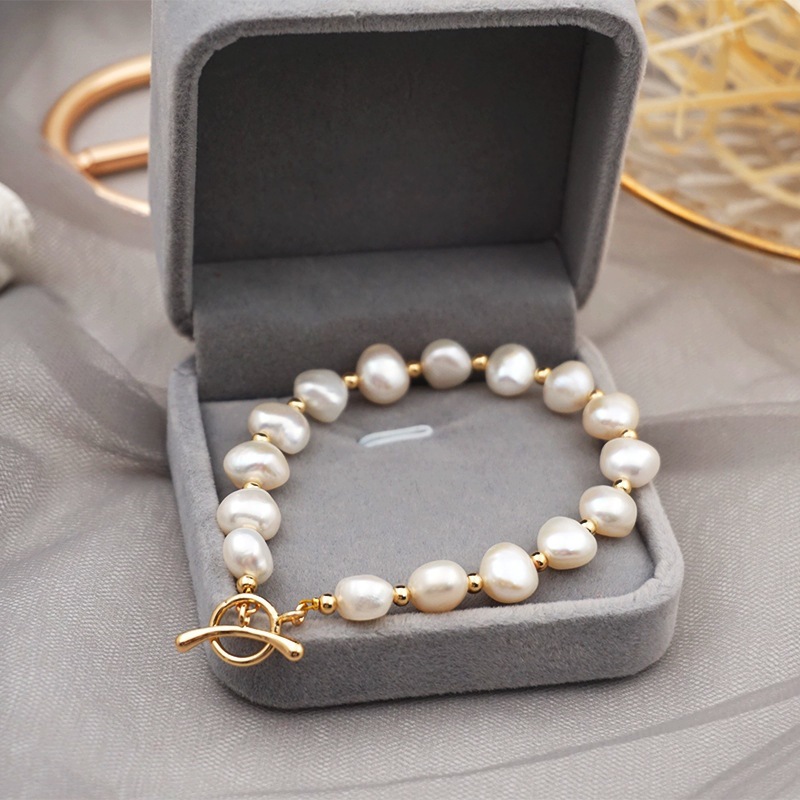 Elbow otbuckle. Pearl style