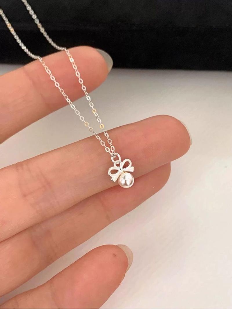 Pearl bow necklace silver plated