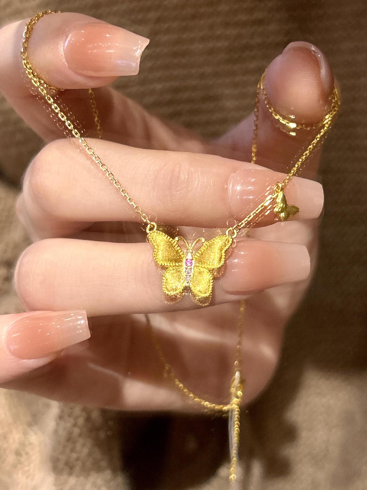 Brushed pink diamond butterfly necklace