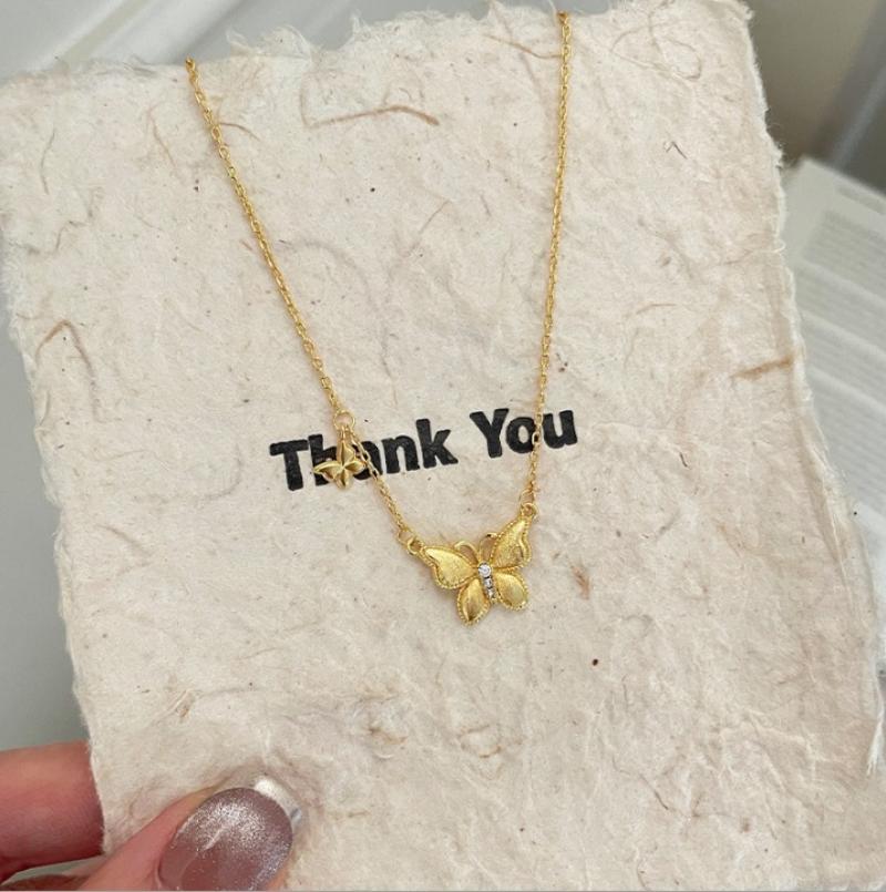 Brushed white diamond butterfly necklace