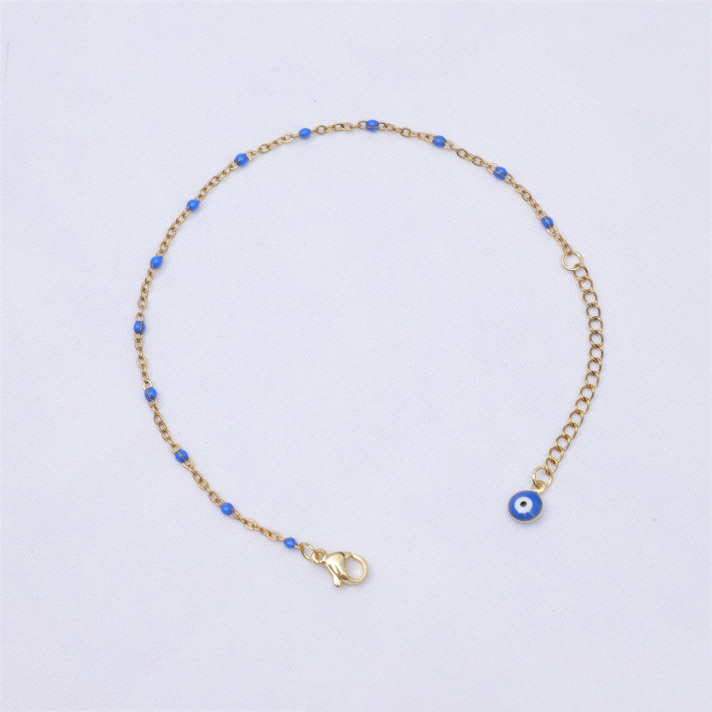 Tail chain eyes gold   sapphire blue