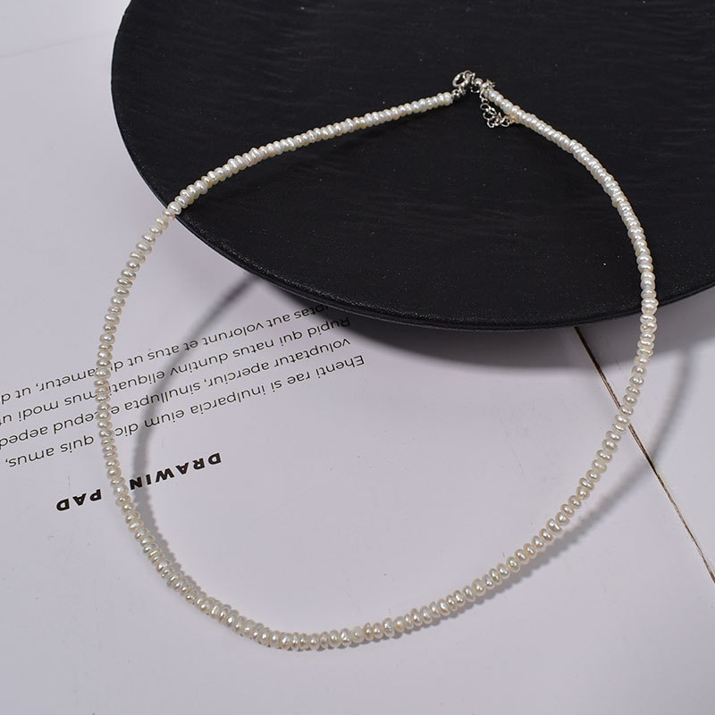 2-3mm white flat beads + 925 silver extension chain