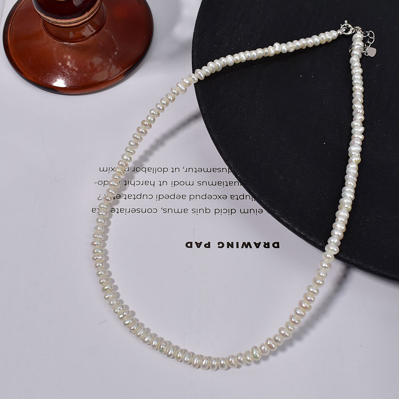 3-4mm white flat beads + 925 silver extension chain