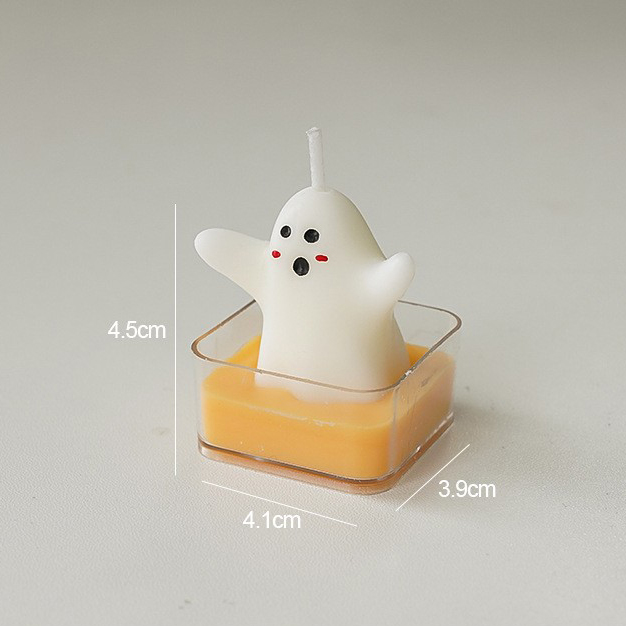 Halloween tea candle screaming ghost (fragrance: english pear freesia)