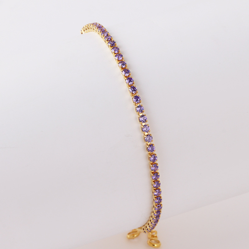 Purple zirconium gold