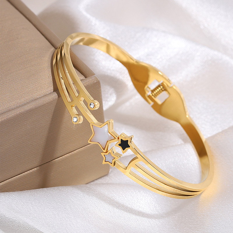 Gold meteor open bracelet