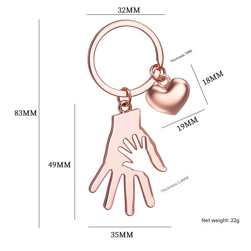 X-1890 hand in hand keychain rose gold