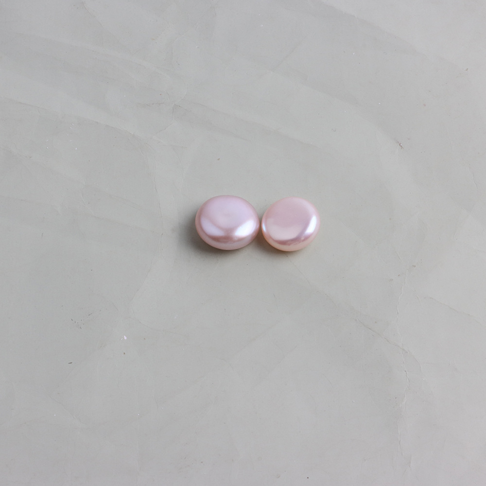 Colorful white buttons, one round