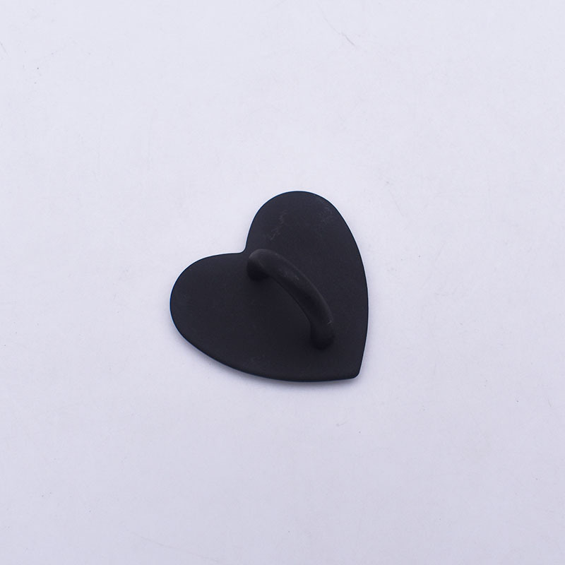 The heart is baked with deep black paint