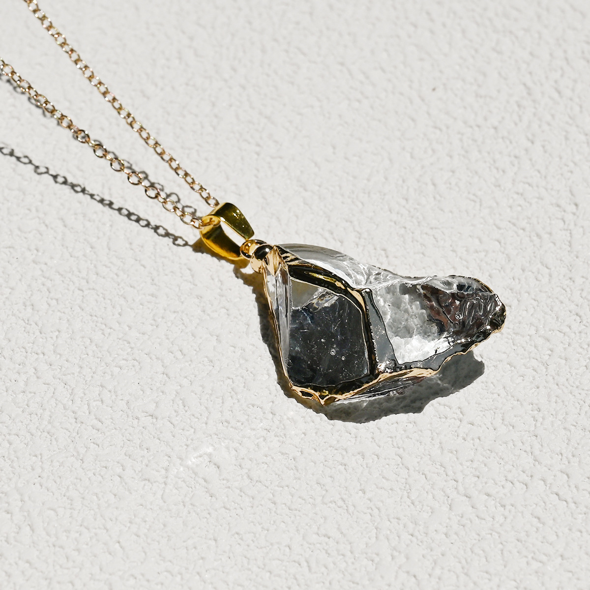 Synthetic light blue crystal (excluding chain)