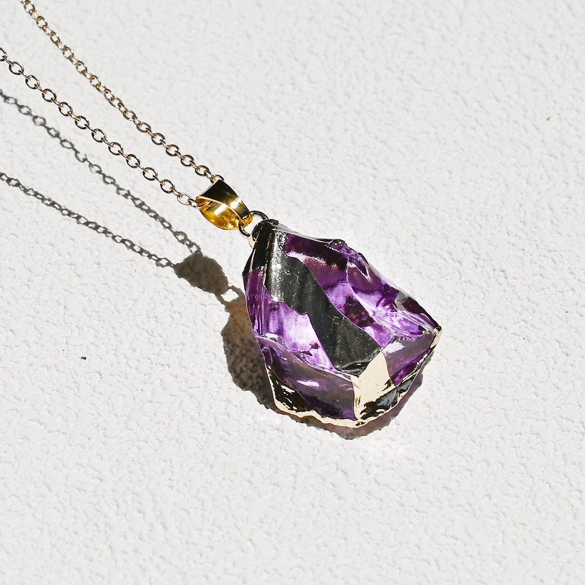 Synthetic amethyst (excluding chain)