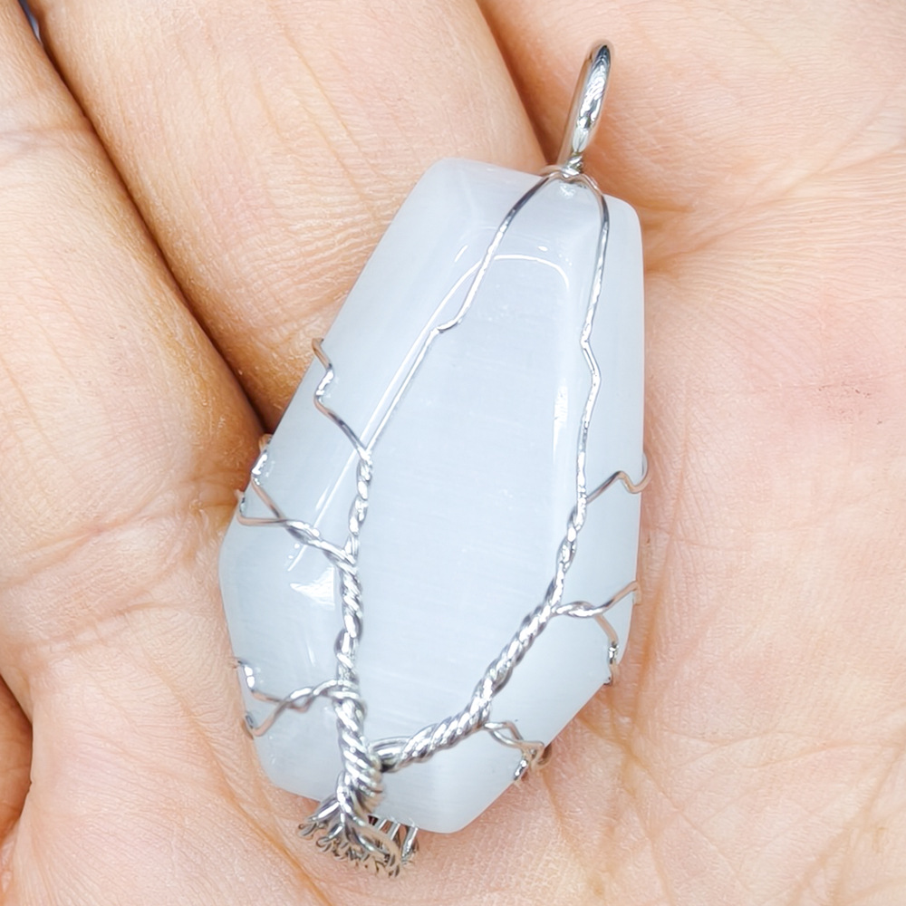 Synthetic white cat s eye stone