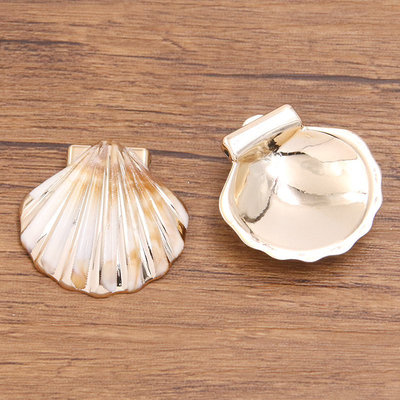 Shell No. 4 measures 31X32mm