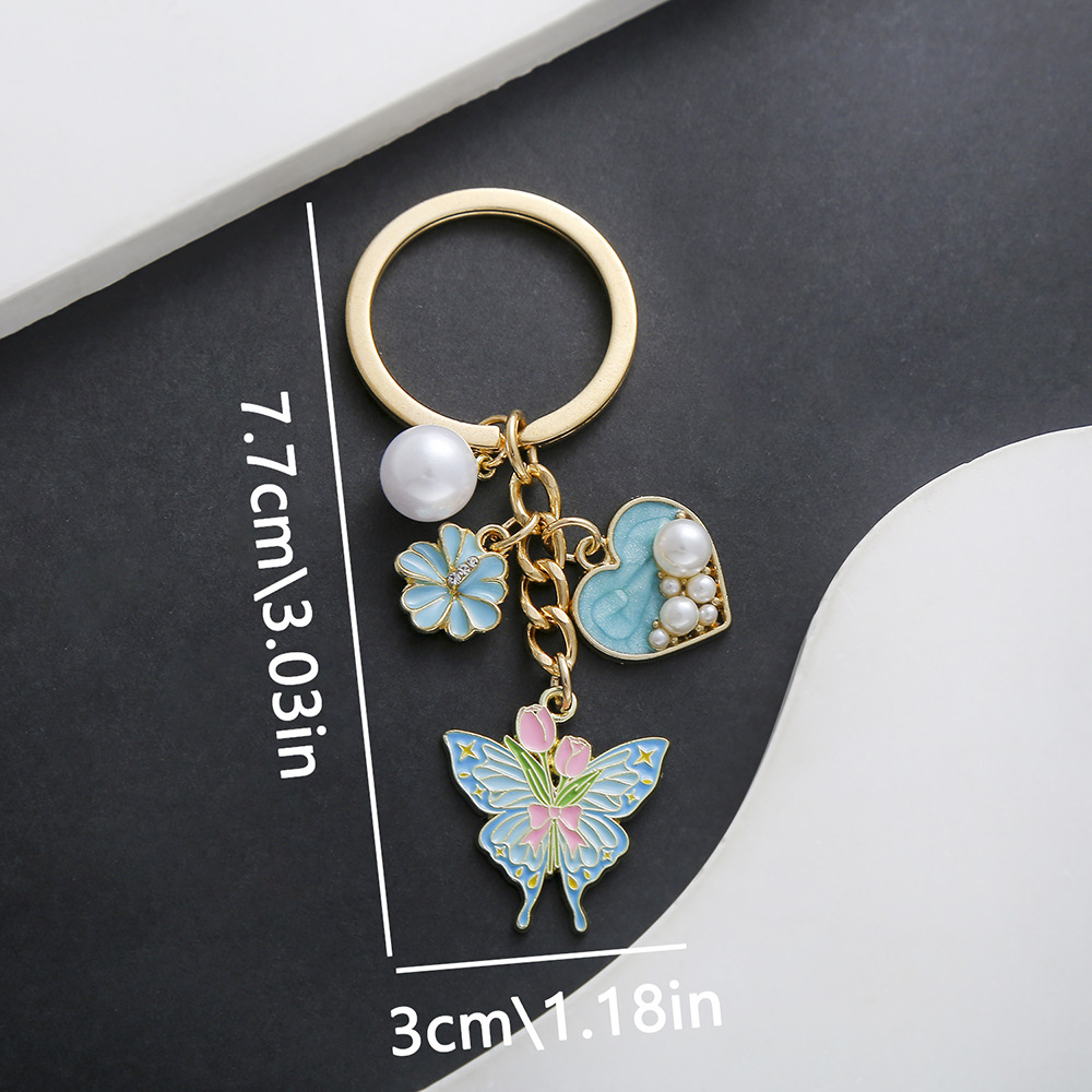 ER725-Drop Oil Lake Blue Love Flower Butterfly Keychain -11.2g