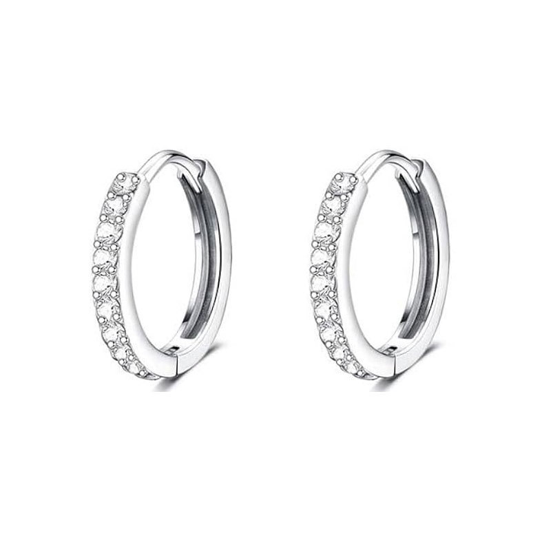 A pair of silver and white zirconium