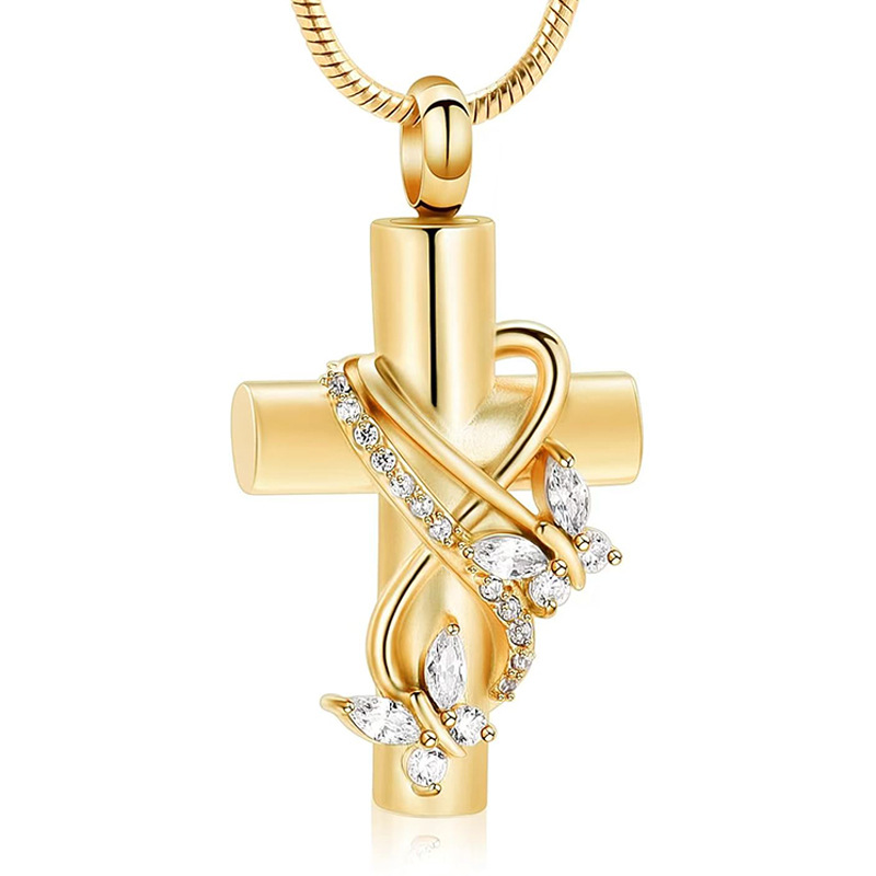 Gold cross with butterfly diamond pendant