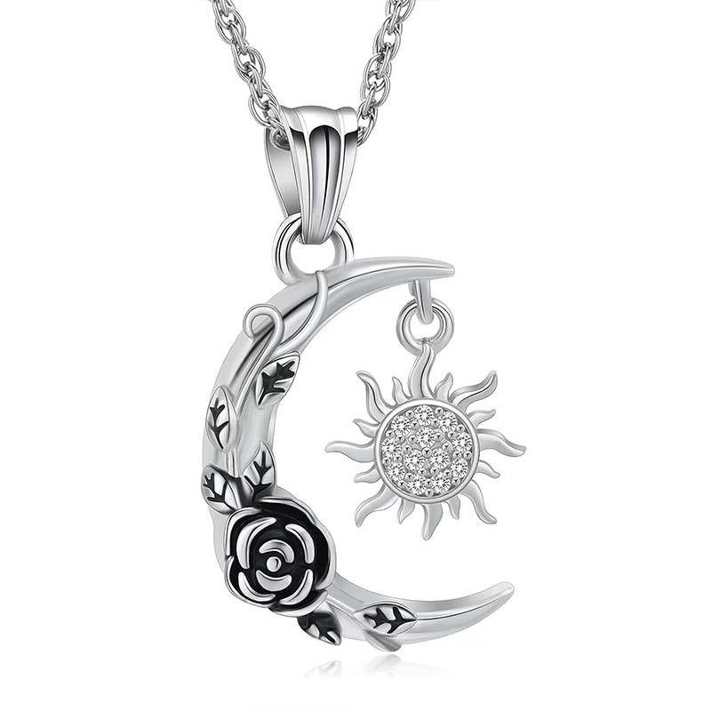 Silver moon sun diamond pendant