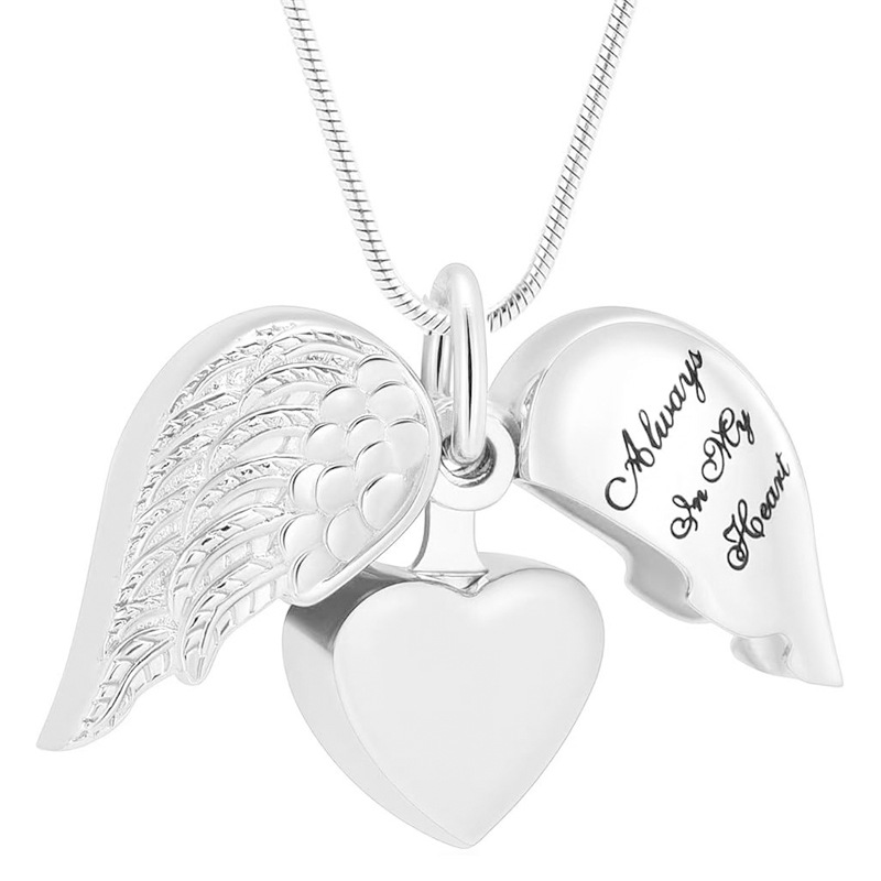 Silver heart shaped wings pendant