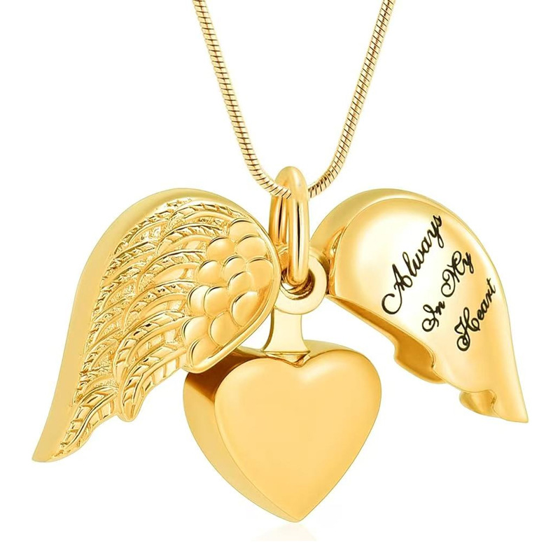Gold heart shaped wings pendant