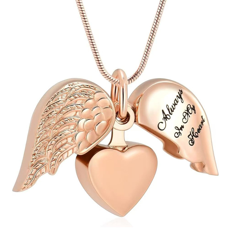 Rose gold heart shaped wings pendant