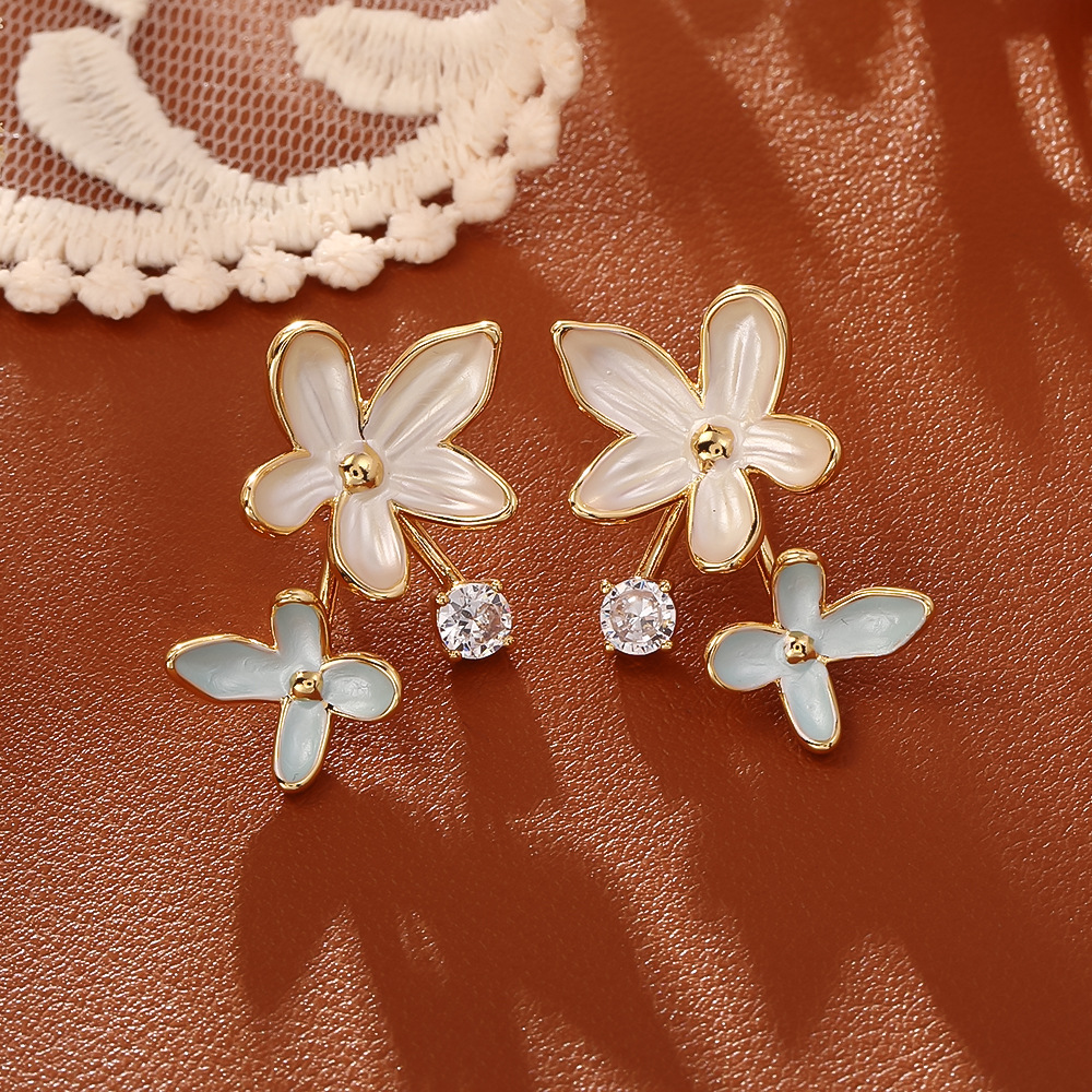 Golden white and blue flower earrings